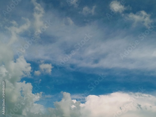 black and white clouds with blue sky © adehan