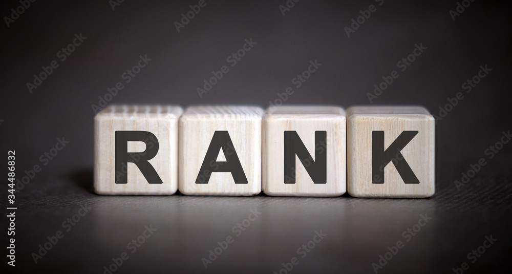 Obraz premium Rank - text on wooden cubes on a black background