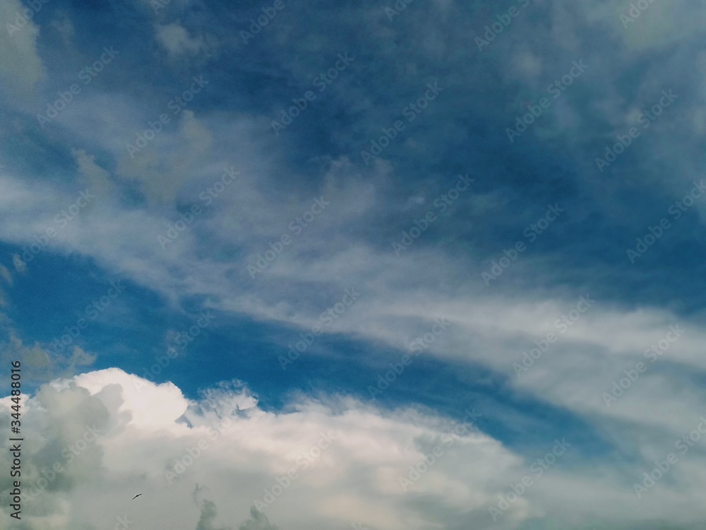 Obraz premium black and white clouds with blue sky
