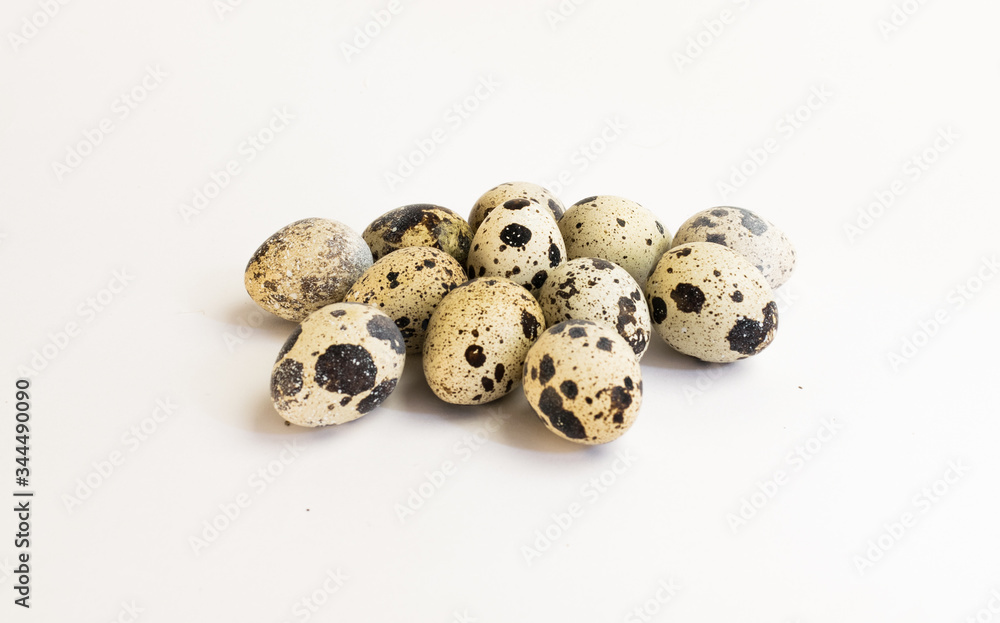 Quail eggs on a light background Quail eggs on a light background
