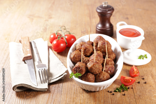 grilled meatball and tomato sauce