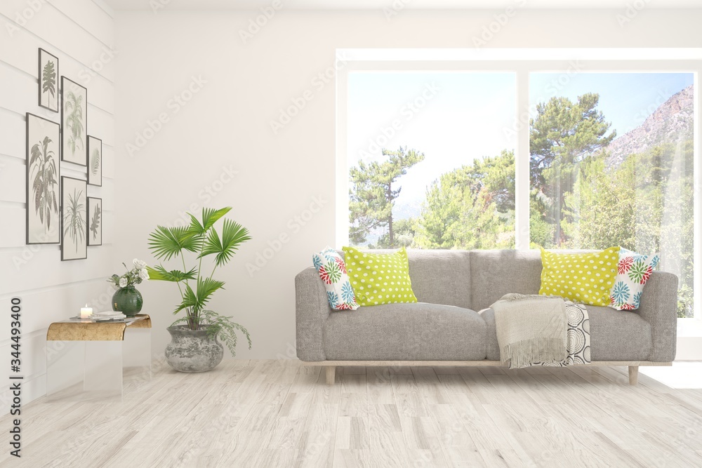 Fototapeta premium White living room with sofa and summer landscape in window. Scandinavian interior design. 3D illustration