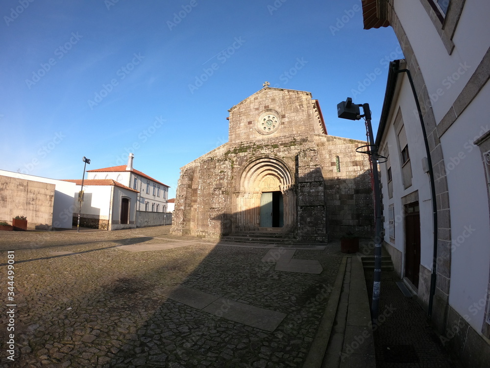 Main facade of the old church of the Monastery of Rates. Benedictine monastery located in the parish of Rates in the municipality of Povoa de Varzim, in Portugal. Main facade of the old church of the Monastery of Rates. Benedictine monastery located in the parish of Rates in the municipality of Povoa de Varzim, in Portugal.