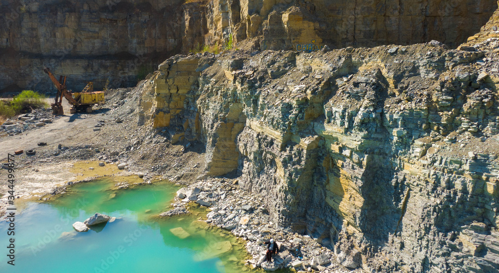 Quarry with beautiful blue water in it. Aerial view from drone