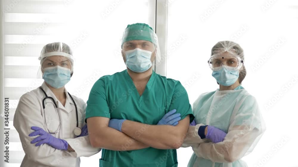 Group of doctors in protective suits is ready to go. Covid-19. Group of doctors in protective suits is ready to go. Covid-19.