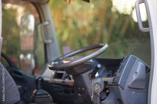 CDL Commercial Driver Inside of His Truck. Transportation Industry Theme photo