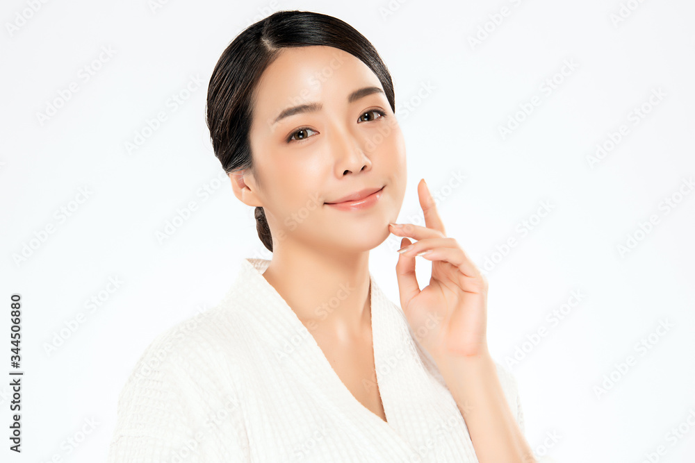 Beautiful Young Asian Woman with Clean Fresh Skin. Face care, Facial treatment, Cosmetology, beauty and healthy skin and cosmetic concept, woman beauty skin isolated on white background Beautiful Young Asian Woman with Clean Fresh Skin. Face care, Facial treatment, Cosmetology, beauty and healthy skin and cosmetic concept, woman beauty skin isolated on white background