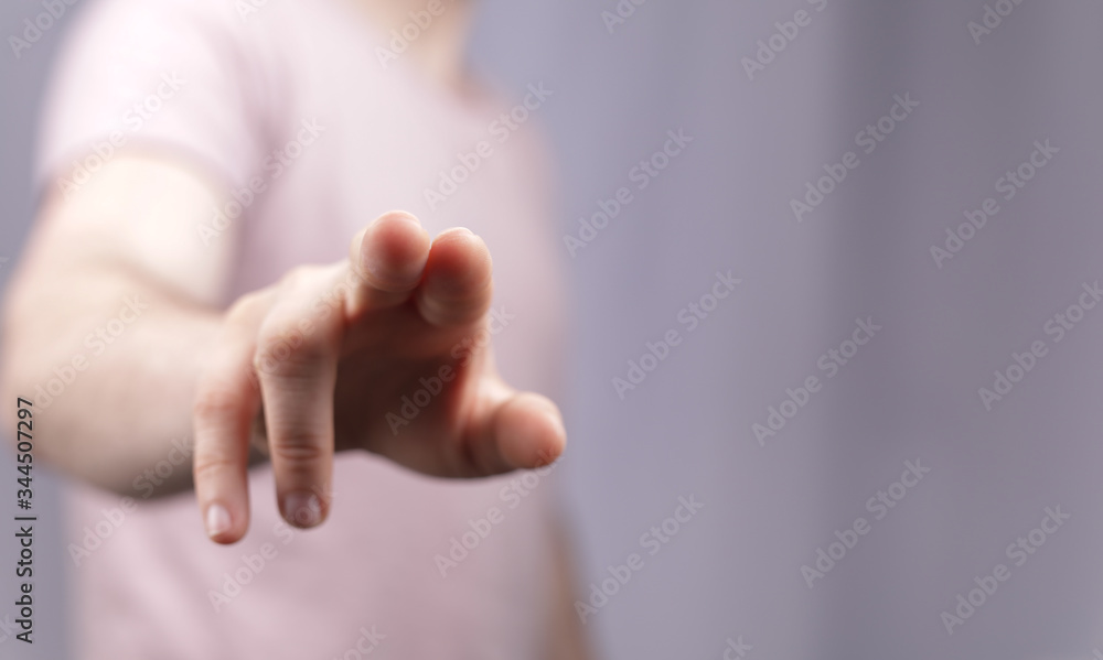 A man hand touching virtual screen, modern background concept , can put your text at the finger, copy space. A man hand touching virtual screen, modern background concept , can put your text at the finger, copy space.