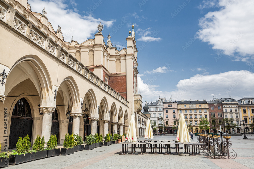 Empty restaurants during coronavirus pandemic in Krakow, Poland. Cloth Hall and Marker Square