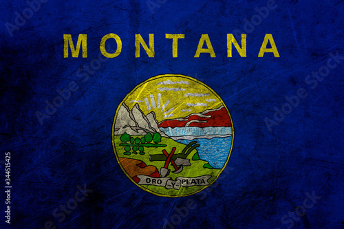 Flag of montana, USA, on a grunge metal texture
