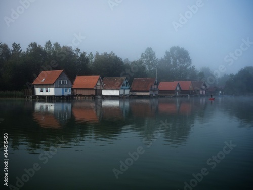 Boat houses at Grosser Alpsee in the Allgaeu in Bavaria photo