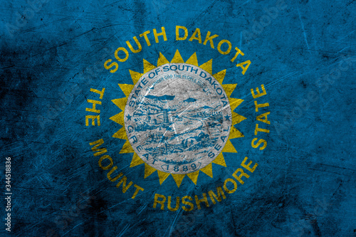 Flag of south dakota, USA, on a grunge metal texture