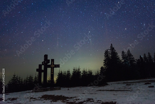 This photo is taken in the mountains near Mirecurea Ciuc, Romania.   Three Holy Crosses in Harghita photo