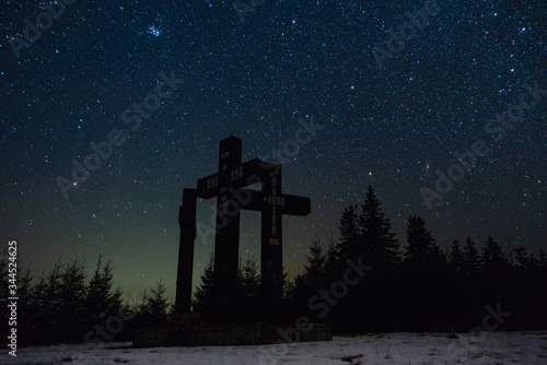 This photo is taken in the mountains near Mirecurea Ciuc, Romania. Three Holy Crosses in Harghita