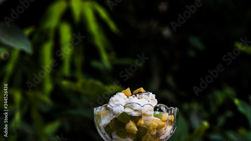 Indian Dried fruit Shrikhand. Shrikhand is an Indian sweet dish made of strained dahi. photo