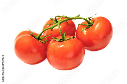 branch with red ripened tomatoes on a white background close-up. isolate