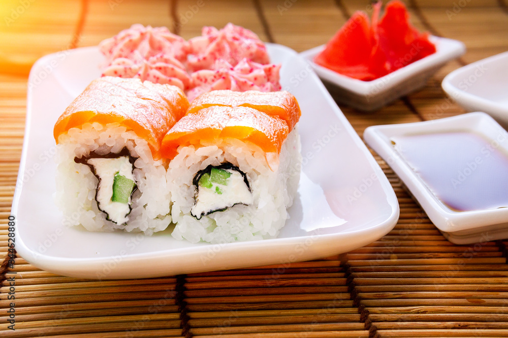 Philadelphia Roll with cream cheese, wrapped with fresh salmon Philadelphia Roll with cream cheese, wrapped with fresh salmon