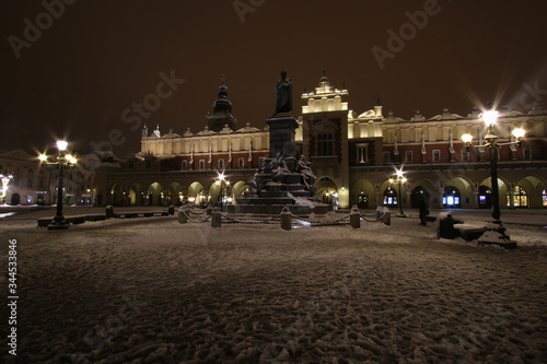 Main Square of Cracow by night, winter time, Poland © bayazed