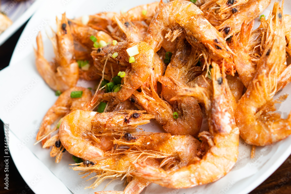 Deep fried shrimp asia style true exotic Thai traditional local food culture fresh natural prawns marinate with organic healthy chili, salt, pepper. Delicious crispy, spicy authentic seafood meal Deep fried shrimp asia style true exotic Thai traditional local food culture fresh natural prawns marinate with organic healthy chili, salt, pepper. Delicious crispy, spicy authentic seafood meal