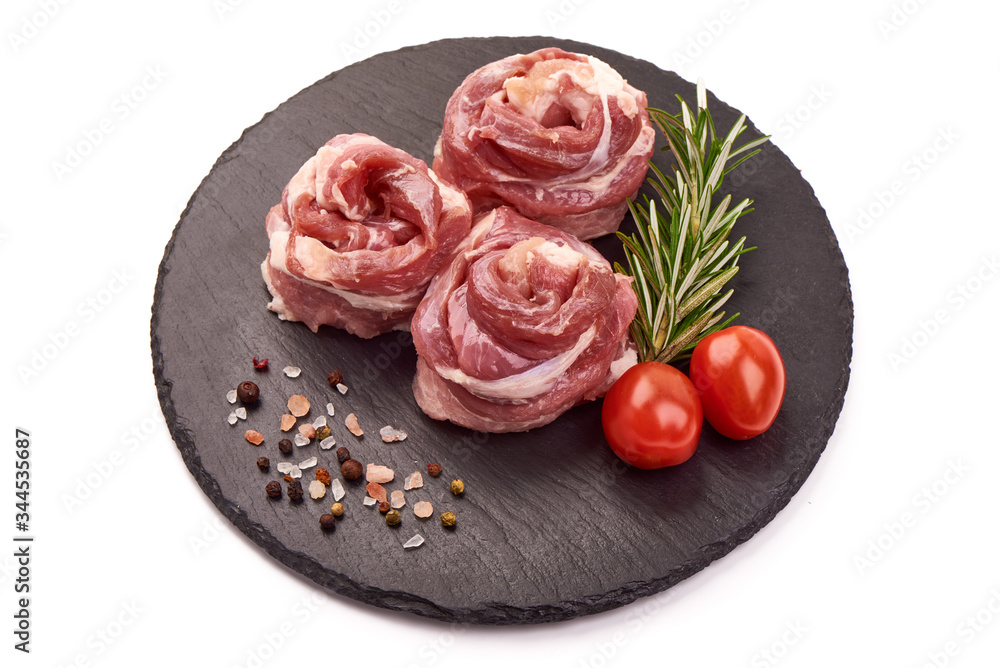 Fresh pork rolls, wrapped meat, isolated on white background Fresh pork rolls, wrapped meat, isolated on white background