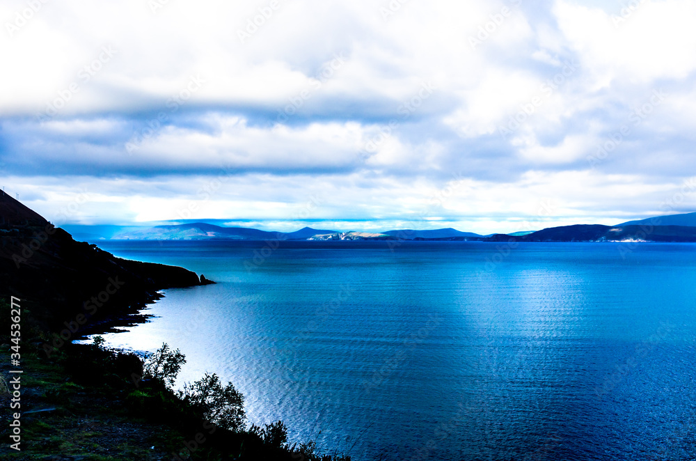 Deep blue Atlantic landscape and natural cloudy sky - coast of Ireland Deep blue Atlantic landscape and natural cloudy sky - coast of Ireland