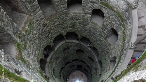 Looking down to the Initiation Well of the Quinta da Regaleira. Sintra, Portugal photo