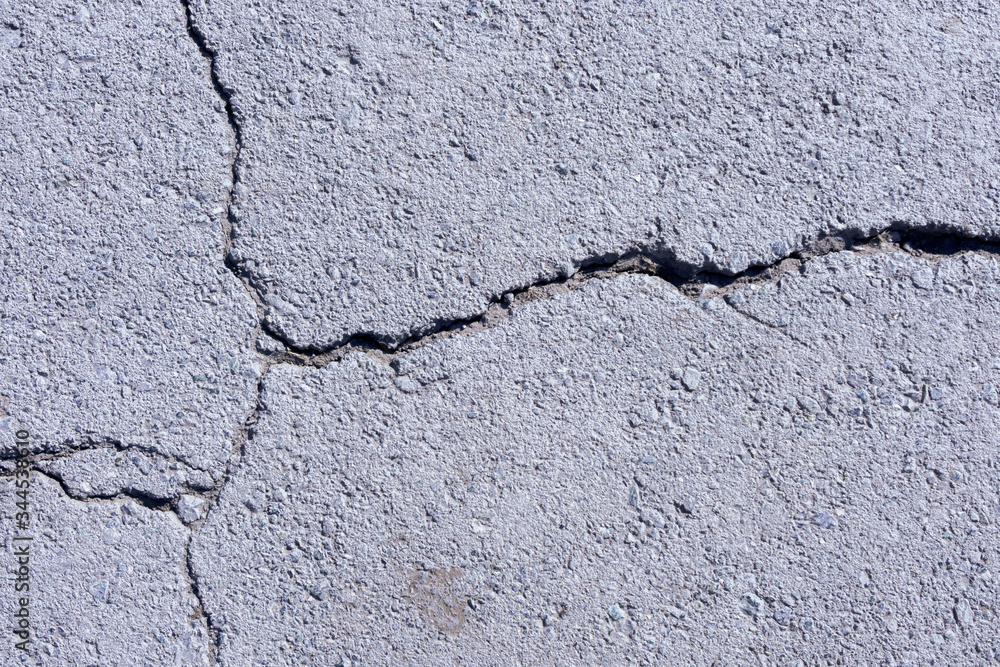 Obraz premium old concrete cement with cracks and natural destruction from time and weather conditions