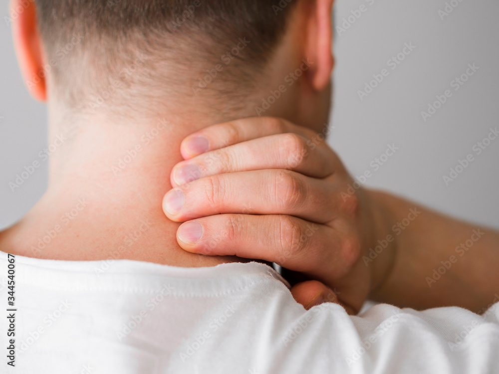Close-up man with neck pain Close-up man with neck pain