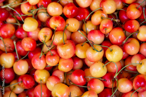 yellow red fresh cherry cherries in food street vegetable market, organic berry