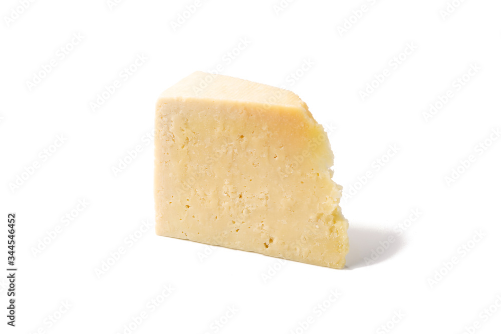 A piece of goat cheese isolated on white A piece of goat cheese isolated on white