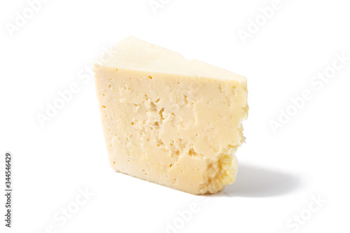 A piece of goat cheese isolated on white