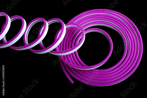 Violet flexible LED neon on black isolated background. Flat lay, copy space, top view. Trendy neon colors background.