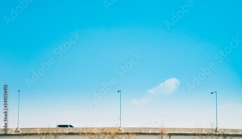 bridge with blue sky and clouds