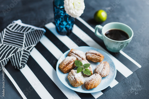 Madeleine cookies with nuts and icing sugar