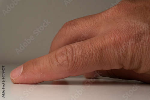 Hands and fingers in detail.