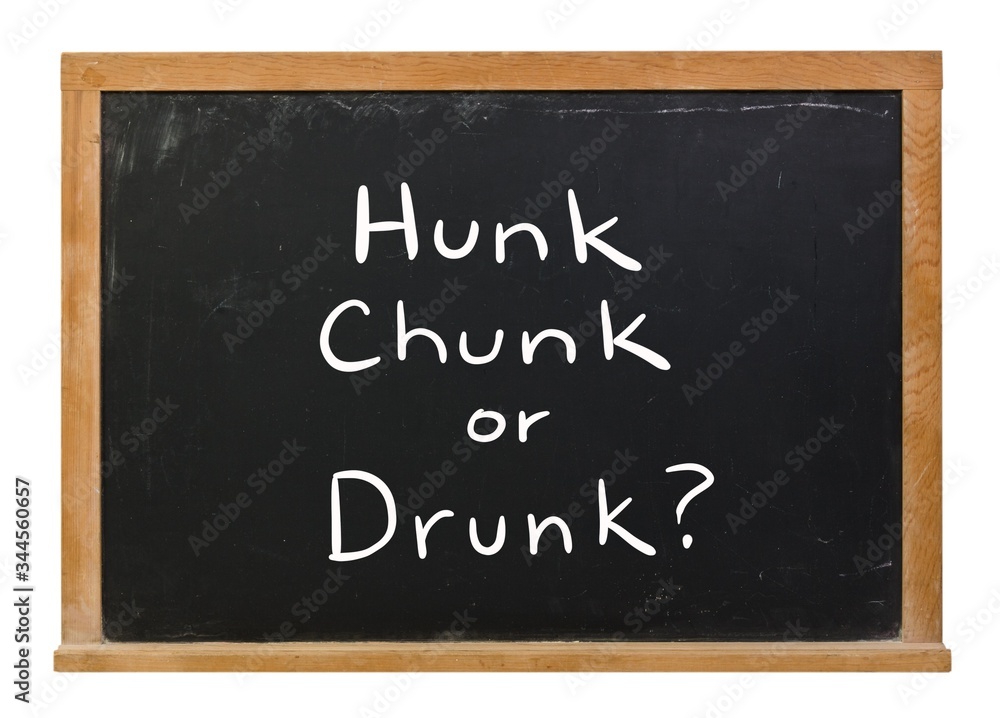Hunk, Chunk or Drunk written in white chalk on a black chalkboard isolated on white