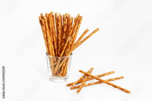 edible snack dry sticks with salt on a white background