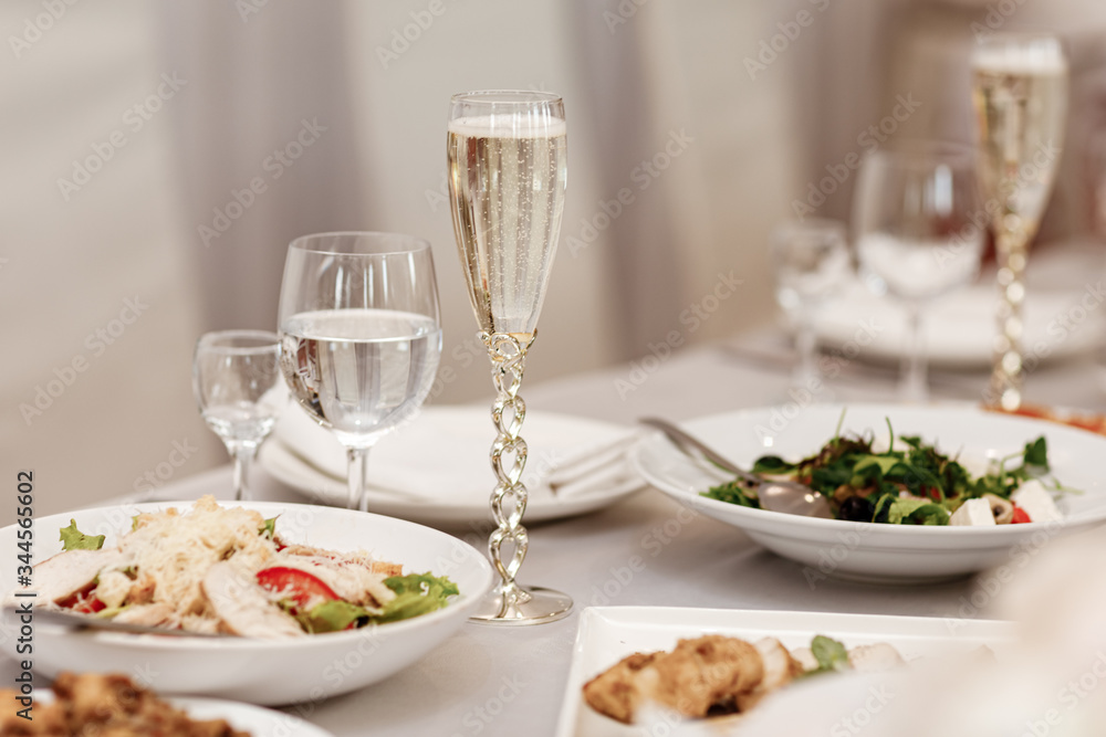 Serving table of a variety of delicious festive food and wine prepared for event party or wedding. selective focus. Serving table of a variety of delicious festive food and wine prepared for event party or wedding. selective focus.