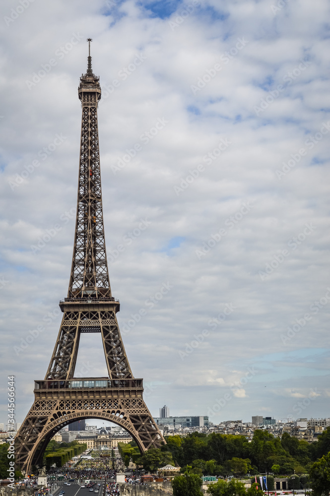 View of the Eiffel Tower in a cloudy summer day, Paris, France.