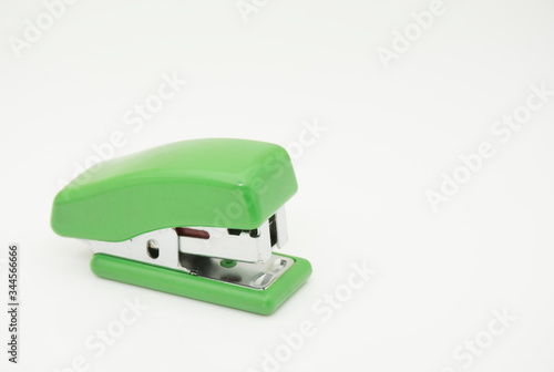 Manual paper stitcher or stapler.