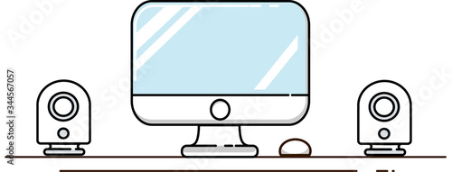 working table with monitor and speakers