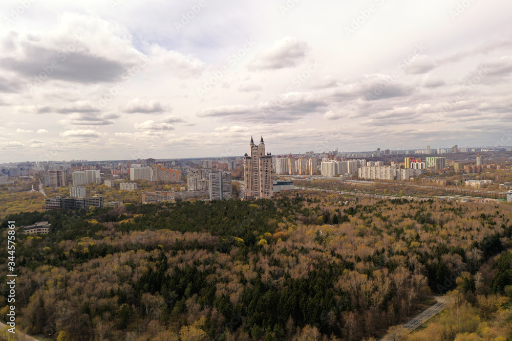 panoramic view of the houses and parks of the big city view from the drone