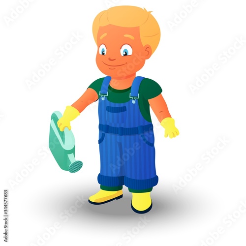 Smiling boy in a denim overall holds watering can