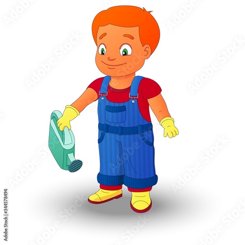 Smiling boy in a denim overall holds watering can