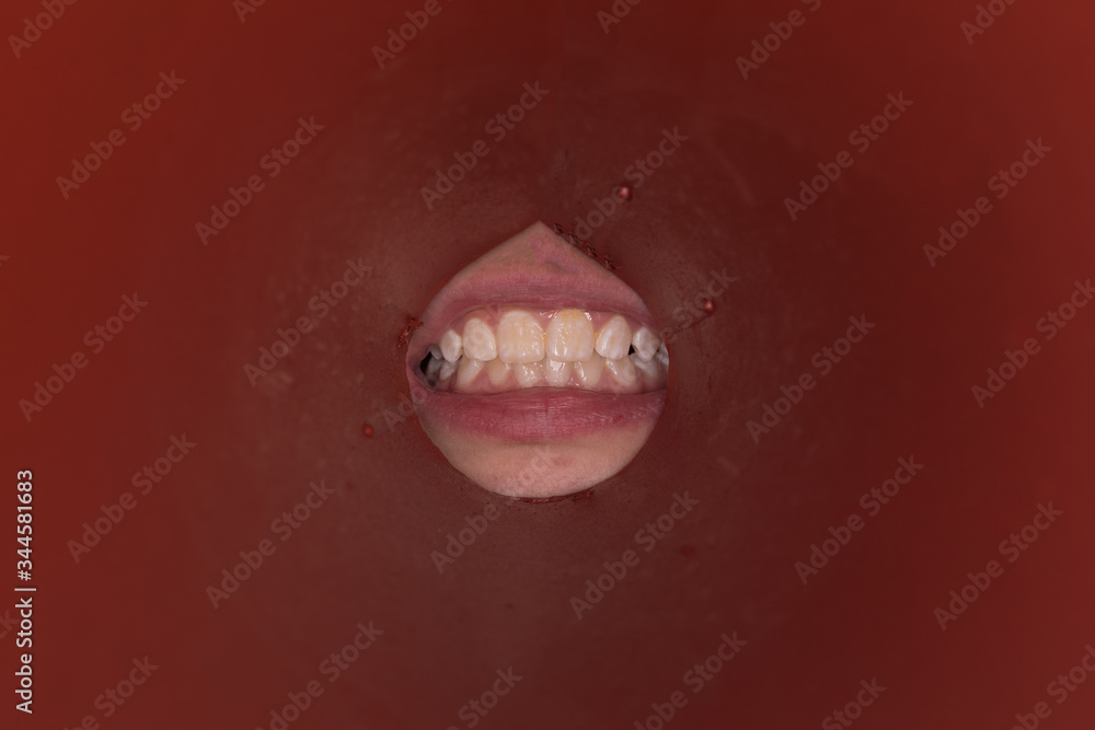 Naklejka premium human teeth in the hole