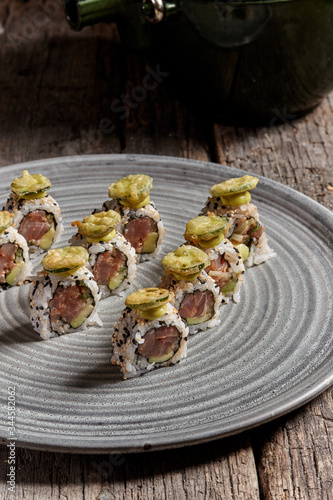 Sushi set sashimi rolls served on