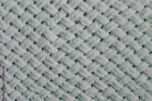 Fabric texture background. Knitted texture pattern. Texture of knitted woolen fabric background. Closeup textile background.