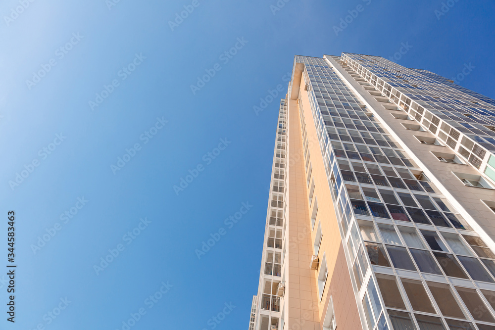 New tall house on a background of blue sky