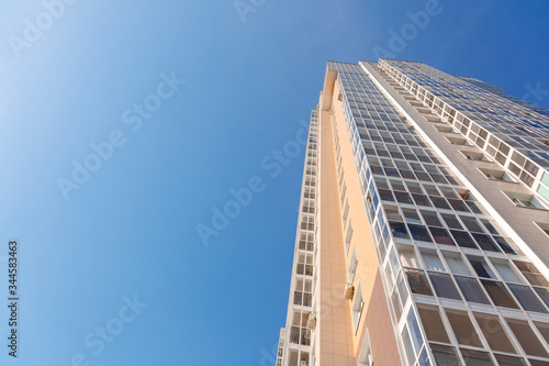 New tall house on a background of blue sky