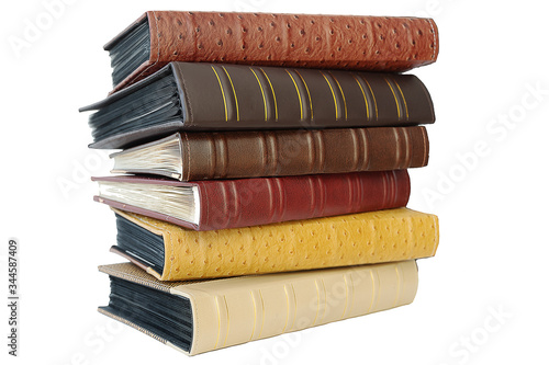 Six multi-colored embossed photo albums are stacked on top of each other. Isolate on white background. Side view. Pile of photo albums.  Concept - family photo, memorable events